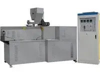 Extrusion puffing machine